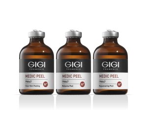 Three GIGI Medic Peel glass amber bottles with silver caps displaying professional chemical peel solution for dermatological treatments